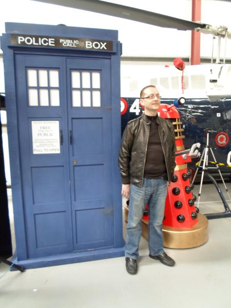 Nick stood outside The Tardis, Dalek in background